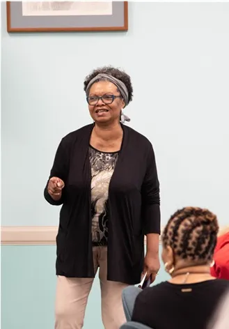 marcia-standing-alone2-2024-conference.webp